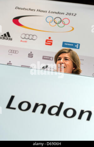 German field hockey player Natascha Keller druing a press conference at German House in London, Britain, 25 July 2012. She will be the German flag bearer during the Olympics opening ceremony on Friday. Photo: Peter Kneffel dpa  +++(c) dpa - Bildfunk+++ Stock Photo