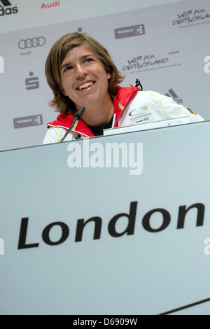 German field hockey player Natascha Keller druing a press conference in London, Britain, 25 July 2012. She will be the German flag bearer during the Olympics opening ceremony on Friday. Photo: Peter Kneffel dpa  +++(c) dpa - Bildfunk+++ Stock Photo