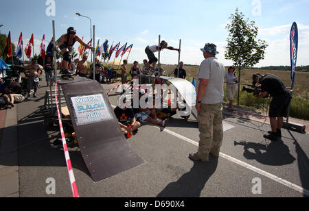 (dpa-file) - A file picture dated July 2010 shows two skateboarders standing on a ramp at the start of a race of the Slalom Skateboard World Championships in Hradec Kralove, Czech Republic. Stars of the slalom skateboarding scene meet again for this year's World Championships in Stuttgart and Ostfildern between 27 and 29 July 2012. Photo: Petr Klein Stock Photo