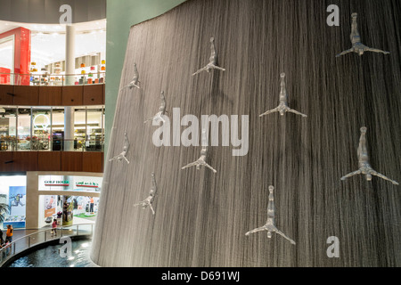 View of interior of Dubai Mall with waterfall feature in United Arab Emirates Stock Photo