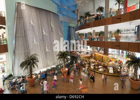 View of interior of Dubai Mall with waterfall feature in United Arab Emirates Stock Photo