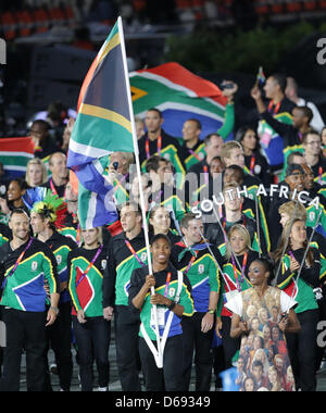 Olympic team of South Africa with flag bearer and athlete Caster Semenya arrive into the Olympic stadium during the Opening Ceremony of the London 2012 Olympic Games, London, Britain, 27 July 2012. The 2012 Summer Olympic Games will be held in London from 27 July to 12 August 2012. Photo: Michael Kappeler dpa  +++(c) dpa - Bildfunk+++ Stock Photo