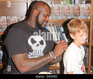 Shaquille O'Neal greets fans and signs copies of his book 'Shaq Uncut' at Books and Books Coral Gables, Florida - 05.12.11 Stock Photo