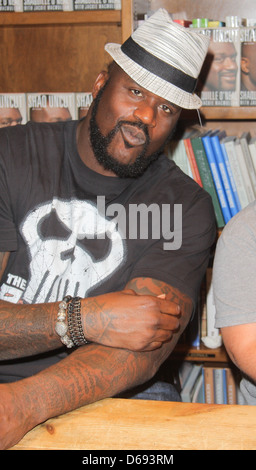 Shaquille O'Neal greets fans and signs copies of his book 'Shaq Uncut' at Books and Books Coral Gables, Florida - 05.12.11 Stock Photo