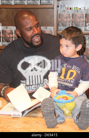 Shaquille O'Neal greets fans and signs copies of his book 'Shaq Uncut' at Books and Books Coral Gables, Florida - 05.12.11 Stock Photo