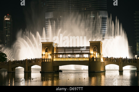 View at night of Dubai Fountain at the Dubai Mall in Downtown Dubai United Arab Emirates Stock Photo