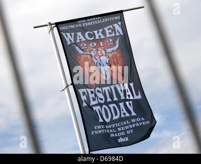 A Wacken flag flies in Wacken, Germany, 30 July 2012. The world's biggest heavy metal festival will take place in Wacken from 02 August till 04 August 2012. Photo: Daniel Bockwoldt Stock Photo