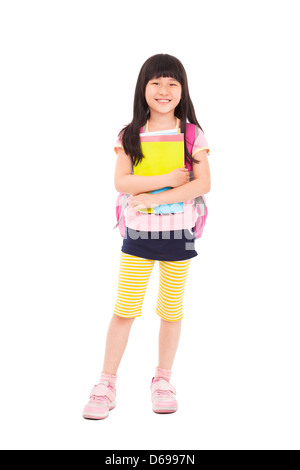 full length of asian little girl standing and holding books Stock Photo