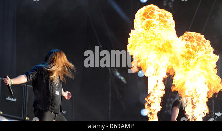 Singer of Swedish band Hammerfall, Joacim Cans, performs at Wacken Open Air Festival in Wacken, Germany, 04 August 2012. The world's biggest heavy metal festival takes place in Wacken from 02 till 03 August 2012. Photo: DANIEL REINHARDT Stock Photo