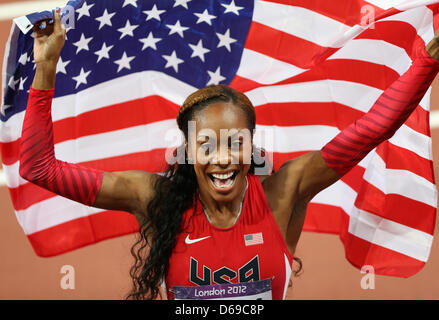 Gold medalist Sanya Richards-Ross of USA celebrates after the Women's 400 m final during the London 2012 Olympic Games Athletics, Track and Field events at the Olympic Stadium, London, Great Britain, 05 August 2012. Photo: Friso Gentsch dpa  +++(c) dpa - Bildfunk+++ Stock Photo