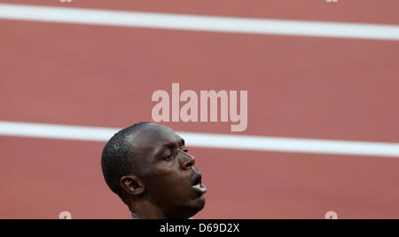 Jamaica's Usain Bolt celebrates after the Men's 100m final during the London 2012 Olympic Games Athletics, Track and Field events at the Olympic Stadium, London, Great Britain, 05 August 2012. Photo: Friso Gentsch dpa Stock Photo