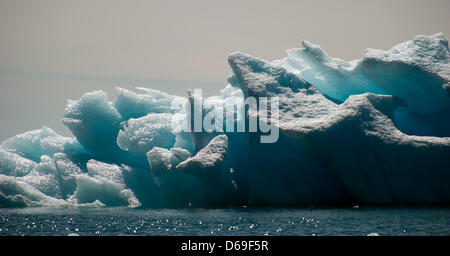 View of icebergs in the Sermilik Fjord near Tiniteqilaaq on Greenland, Denmark, 17 July 2012. Photo: Patrick Pleul Stock Photo