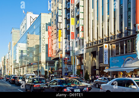 Ginza, Tokyo, Japan. Chuo Dori Street, Matsuya Ginza Department Store on the left and Mitsukoshi Department Store on the right. Stock Photo