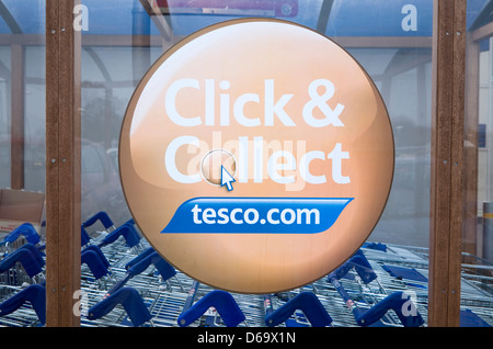 Click and Collect Tesco sign close up, UK Stock Photo