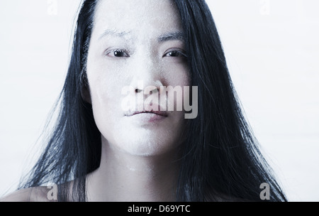 Woman?s face covered in powder Stock Photo