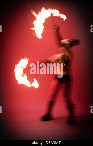 Fire dancer performing Stock Photo