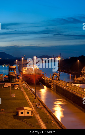 Cargo ship starting his crossing at Miraflores Locks. Panama Canal Stock Photo