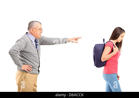 Angry father reprimanding his teenage daughter, isolated on white ...