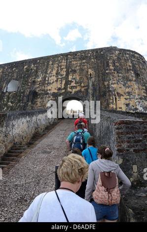 Tourists on walking tour at El Morro, San Juan National Historic Site, San Juan, Puerto Rico Stock Photo