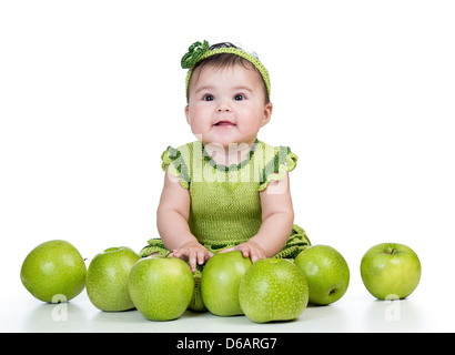 happy baby with green apples isolated on white background Stock Photo