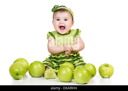 happy baby with green apples isolated on white background Stock Photo