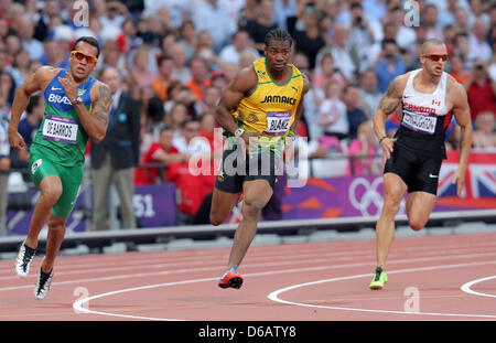 Yohan Blake of Jamaica (C) competes in the Men's 200m semi-final at the London 2012 Olympic Games Athletics, Track and Field events at the Olympic Stadium, London, Britain, 08 August 2012. Photo: Christian Charisius dpa  +++(c) dpa - Bildfunk+++ Stock Photo