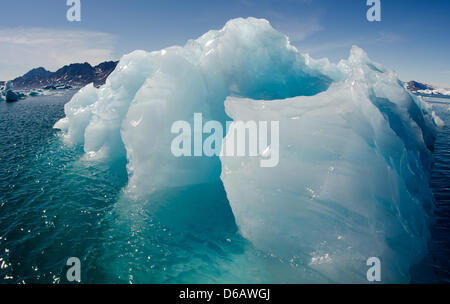 View of icebergs in the Sermilik Fjord near Tiniteqilaaq on Greenland, Denmark, 17 July 2012. Photo: Patrick Pleul Stock Photo