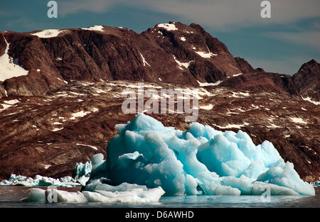 View of icebergs in the Sermilik Fjord near Tiniteqilaaq on Greenland, Denmark, 17 July 2012. Photo: Patrick Pleul Stock Photo