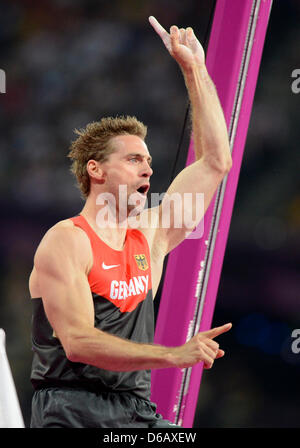 Bjoern Otto of Germany celebrates in the Men's Pole Vault final of the London 2012 Olympic Games Athletics, Track and Field events at the Olympic Stadium, London, Great Britain, 10 August 2012. Photo: Marius Becker dpa  +++(c) dpa - Bildfunk+++ Stock Photo