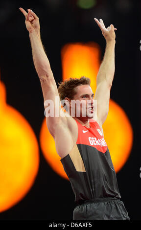 Bjoern Otto of Germany celebrates in the Men's Pole Vault final of the London 2012 Olympic Games Athletics, Track and Field events at the Olympic Stadium, London, Great Britain, 10 August 2012. Photo: Marius Becker dpa  +++(c) dpa - Bildfunk+++ Stock Photo