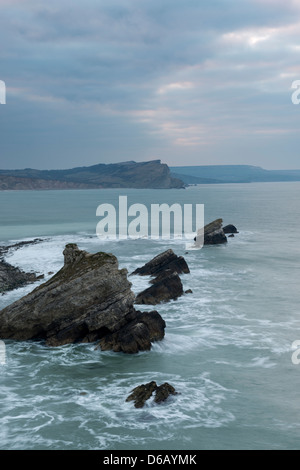 Sunrise over Mupe Rocks and Worbarrow Bay on the Jurassic coastline, Dorset, UK. Stock Photo