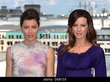 The actresses Jessica Biel (L) and Kate Beckinsale pose for the media during a photocall for the movie 'Total Recall' in Berlin, Germany, 13 August 2012. The movie will be aired to German cinemas on 23 August 2102. Photo: BRITTA PEDERSEN Stock Photo