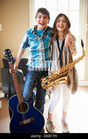 Children holding musical instruments Stock Photo
