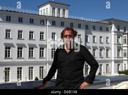 Director Mark von Seydlitz poses during a press sessioin during filming for the movie of the best seller by Dora Heldt, 'Bei Hitze ist es wenigstens nicht kalt' ('In the heat, at least its not cold'), at the Grand Hotel in Heiligendamm, Germany, 14 August 2012. The movie tells the story of Doris Goldstein-Wagner (Christine Neubauer), who travel to the hotel on the Baltic Sea for a  Stock Photo