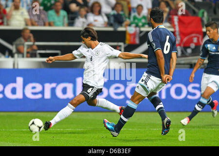 Germany's Sami Khedira (L) vies for the ball with Argentina's Ezequiel Garay  during the friendly soccer match between Germany and Argentina at the Commerzbank-Arena in Frankfurt/Main, Germany, 15 August 2012. Photo: Revierfoto Stock Photo