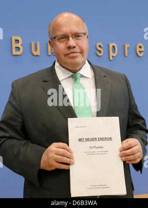 German Minister for the Environment, Nature Conservation and Nuclear Safety Peter Altmaier (CDU) gives a press conference in Berlin, Germany, 16 August 2012. Altmaier presented his 10 step program for the energy turn which he would like to implement until the next parliamentary elections in 2013. Photo: STEPHANIE PILICK Stock Photo