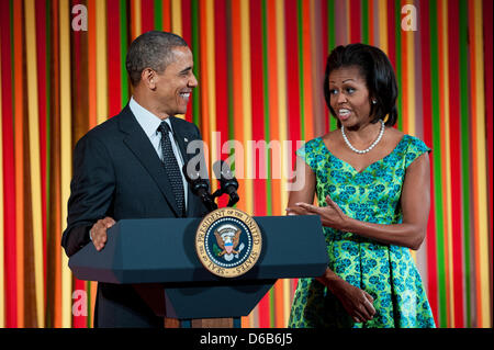 United States President Barack Obama makes an appearance as First Lady Michelle Obama hosts the first ever Kids' State Dinner, at the White House in Washington, D.C., U.S., on Monday, 20 August 2012. The First Lady invited 54 kids, ages 8-12 representing all U.S. states, three territories and the District of Columbia, to a luncheon featuring a selection of healthy recipes from the  Stock Photo