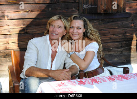 Hansi Hinterseer poses with his wife Ramona during the presentation
