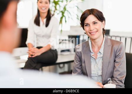 Business people talking in office Stock Photo