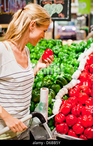 Woman shopping in grocery store Stock Photo