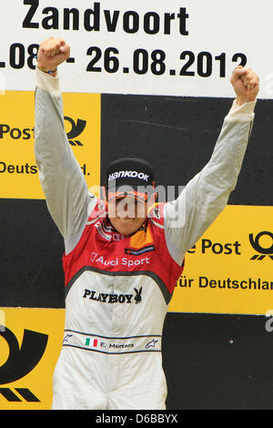 HANDOUT - A handout file dated 26 August 2012 shows Audi pilot Edoardo Mortara of Team Rosberg from Italy celebrating his title during the victory ceremony of the German Touring Car Masters (DTM) after the seventh run in Zandvoort, The Netherlands. Photo: ITR/JUERGEN TAP (ATTENTION: For editorial use only) Stock Photo