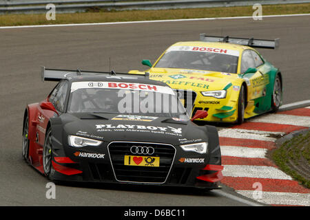 HANDOUT - A handout file dated 26 August 2012 shows Italian Audi pilot Edoardo Mortara of Team Rosberg ahead of German Audi pilot Mike Rockenfeller of Team Phoenix Racing during the German Touring Car Masters (DTM) in Zandvoort, The Netherlands. Mortara won the seventh race of the DTM season and Rockenfeller finished second. Photo: ITR/JUERGEN TAP (ATTENTION: For editorial use only Stock Photo