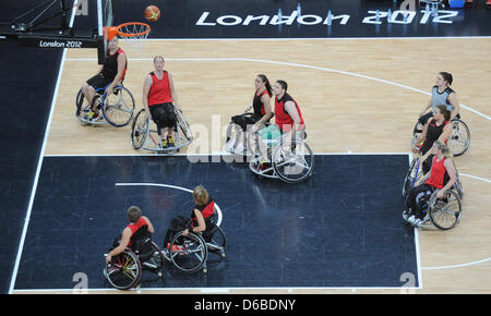 The women's wheelchair basketball team of Germany is seen during a training session at the Basketball Arena before the London 2012 Paralympic Games, London, Great Britain, 28 August 2012. Photo: Julian Stratenschulte dpa Stock Photo
