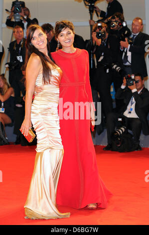 British actress Gabriella Wright (L) Italian actress and Gisella Marengo arrive for the premiere of the movie 'The Iceman' at the 69th Venice Film Festival in Venice, Italy, 30 August 2012. The movie is presented out of competition at the festival which runs from 29 August to 08 September. Photo: Jens Kalaene Stock Photo