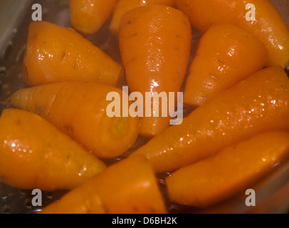 Carrots cooking in Electric Steamer Stock Photo