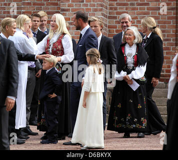 Crown Princess Mette-Marit of Norway (5-L), Crown Prince Haakon of Norway (C), Princess Ingrid Alexandra (FRONT CENTER R), Prince Sverre Magnus (FRONT CENTER L) and Marius Borg Hoiby (2-L), son of Crown Princess Mette-Marit, leaving the confirmation service for Marius Borg Hoiby at Asker church in Asker, 02 September 2012. Photo: Albert Nieboer / NETHERLANDS OUT Stock Photo