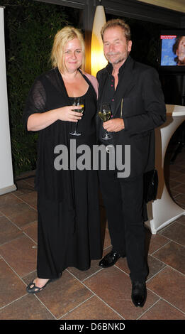 Austrian director Ulrich Seidl and his wife Veronika Franz attend a cocktail party of Film- und Medienstiftung NRW, a state funding agency of Germany's federal state Northrine Westphalia, at the restaurant Valentino at the Lido during the 69th Venice International Film Festival in Venice, Italy, 02 September 2012. Photo: Jens Kalaene dpa Stock Photo