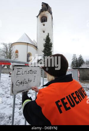 The burned out church tower of St. Nicholas Church is pictured in Wald, Germany, 06 January 2012. According to police reports, the cause of the fire was probably lightning. More than 200 firemen battled the fire. Photo: PATRICK SEEGER Stock Photo