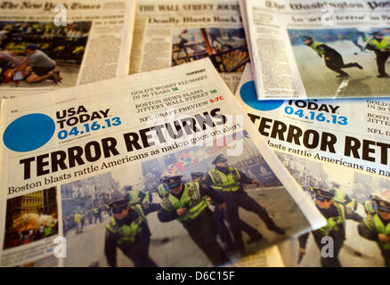 ILLUSTRATION - The New York Times, The Wall Street Journal, The Washington Post and USA Today Newspapers headlines are seen in Washington D.C., USA, 16 April 2013. Three people were killed and over 100 were injured when two bombs exploded on 15 April 2013 at the finish line of the Boston marathon. Foto: Arno Burgi dpa +++(c) dpa - Bildfunk+++ Stock Photo