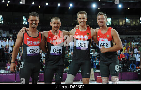 The German relay team Heinrich Popow (l-r), Wojtek Czyz, Markus Rehm and David Behre are seen after the men's 4x100m relay -T42-46 at the Olympic Stadium during the London 2012 Paralympic Games, London, Great Britain, 05 September 2012. Photo: Julian Stratenschulte dpa Stock Photo